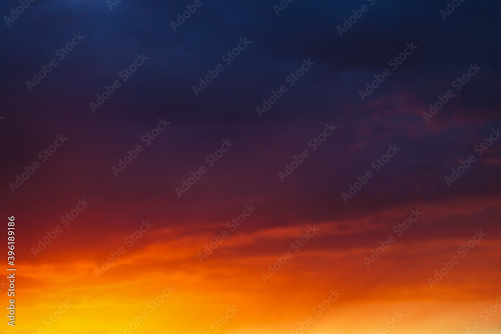Fototapeta premium Dramatic field during sunset before a thunderstorm, nature background.
