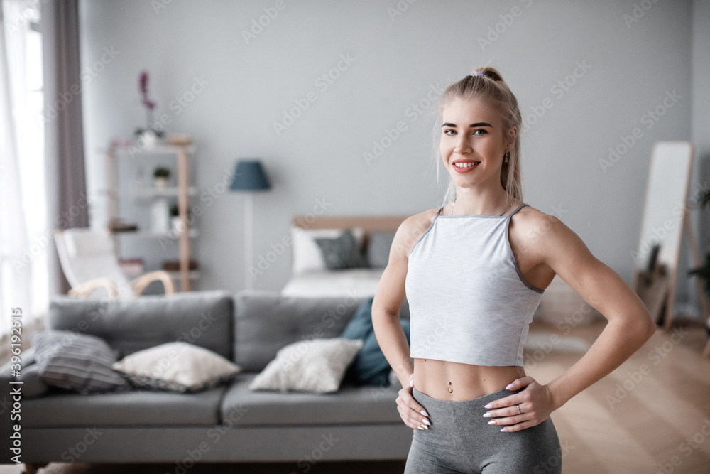Portrait fitness woman at home