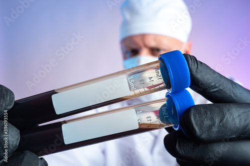 Blood test. The doctor is h...
