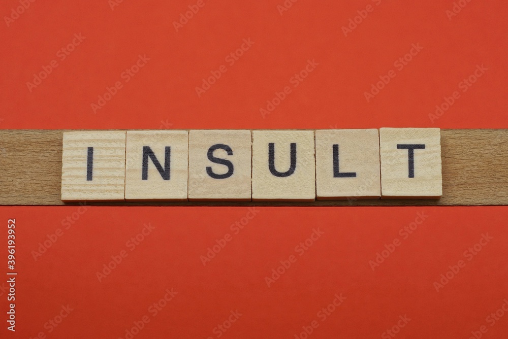 text the word insult from gray wooden small letters with black font on an red table text the word insult from gray wooden small letters with black font on an red table