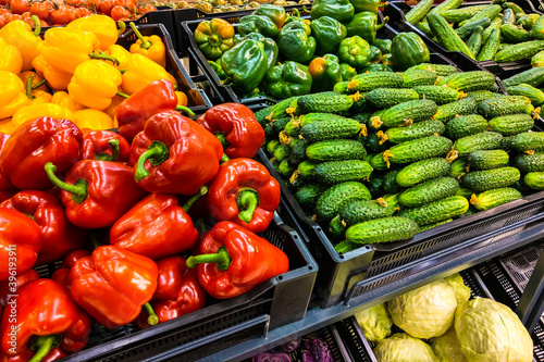 View on the shelf with vegetables in the store, food background.