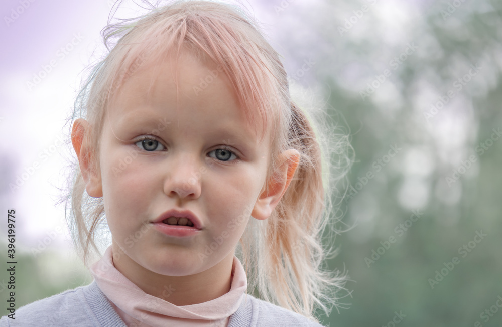 Portrait of a cheerful and funny cute positive five year old girl with white hair. Portrait of a cheerful and funny cute positive five year old girl with white hair.