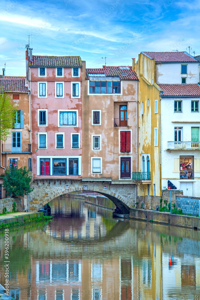 Narbonne, France - houses and water canal