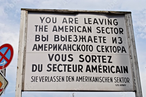 BERLIN, GERMANY: Checkpoint Charlie was the name given by the Western Allies to the best-known Berlin Wall crossing point between East and West Berlin. Sign in English, Russian and German. 