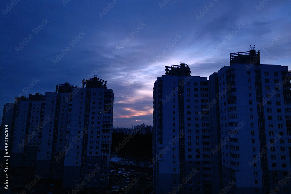 Sunset in the city on the background of high-rise. Sunset in the city on the background of high-rise.