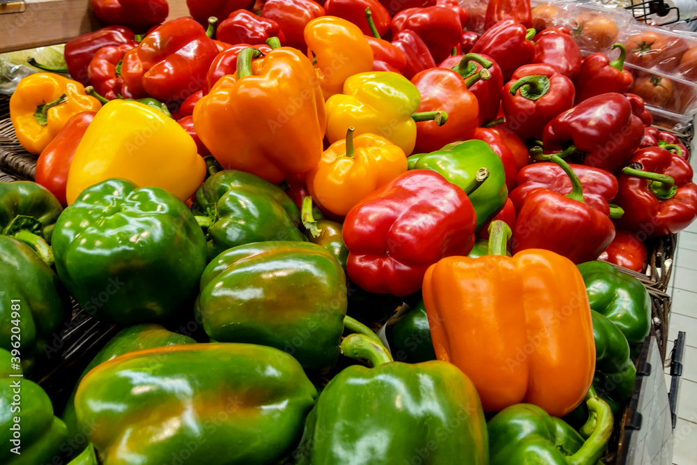 Beautiful multi-colored fresh peppers at the grocery store. Beautiful multi-colored fresh peppers at the grocery store.