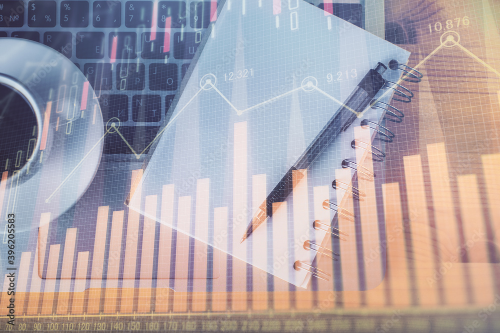 Multi exposure of forex chart drawing and work table top veiw. Concept of financial analysis. Multi exposure of forex chart drawing and work table top veiw. Concept of financial analysis.