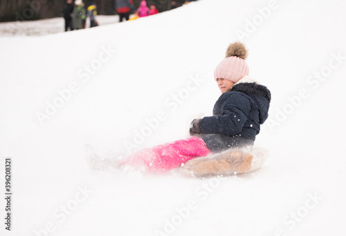 Girl On Sleigh