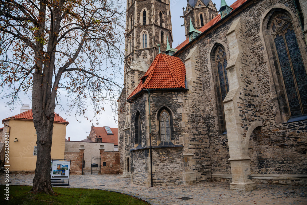 Medieval stone St. Bartholomew´s Church in autumn day, arched windows, chimeras and gargoyles, Gothic Cathedral with belfry in Kolin, Central Bohemia, Czech republic Medieval stone St. Bartholomew´s Church in autumn day, arched windows, chimeras and gargoyles, Gothic Cathedral with belfry in Kolin, Central Bohemia, Czech republic