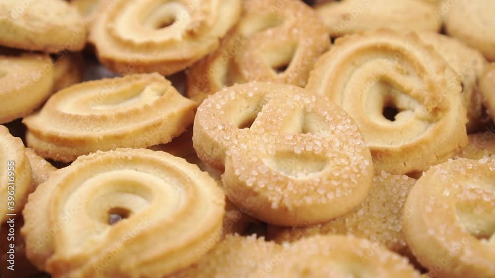 Homemade shortbread cookies with sprinkled sugar close up. Rotation. Macro shot Homemade shortbread cookies with sprinkled sugar close up. Rotation. Macro shot