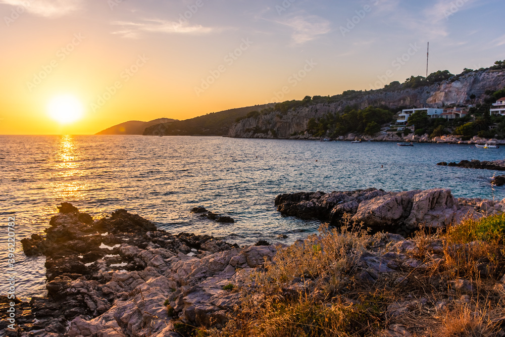 Beautiufl sunset on the rocky beach of Hvar Island, Croatia