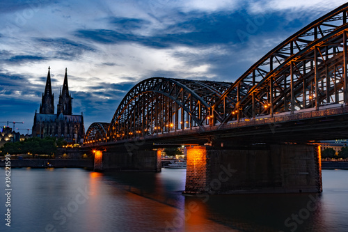 Cologne Cathedral and Hohenzollern Bridge at twilight, Germany