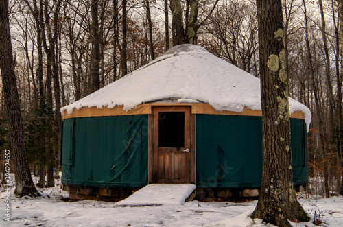 Yurt with snow with trees in winter