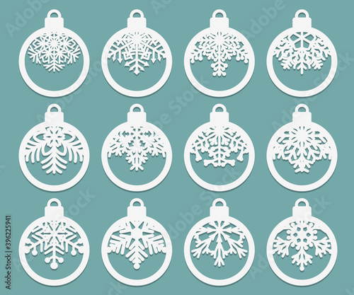Fényképezés Set of laser cut Christmas balls with snowflake cutout of paper Sample Template