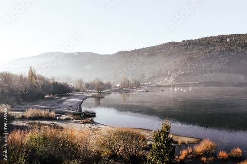 View of Lake Lacar in the province of Neuquen in Argentina in the early morning during Autumn in Patagonia. photo