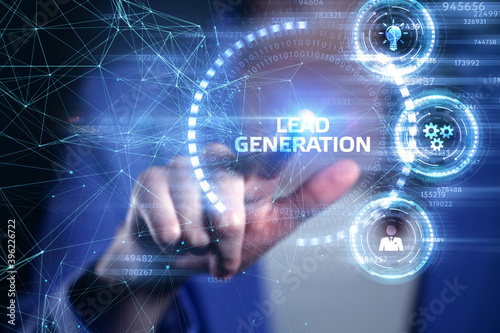 Fototapeta Naklejka Na Ścianę i Meble -  Business, technology, internet and networking concept. Young entrepreneur showing keyword: Lead generation