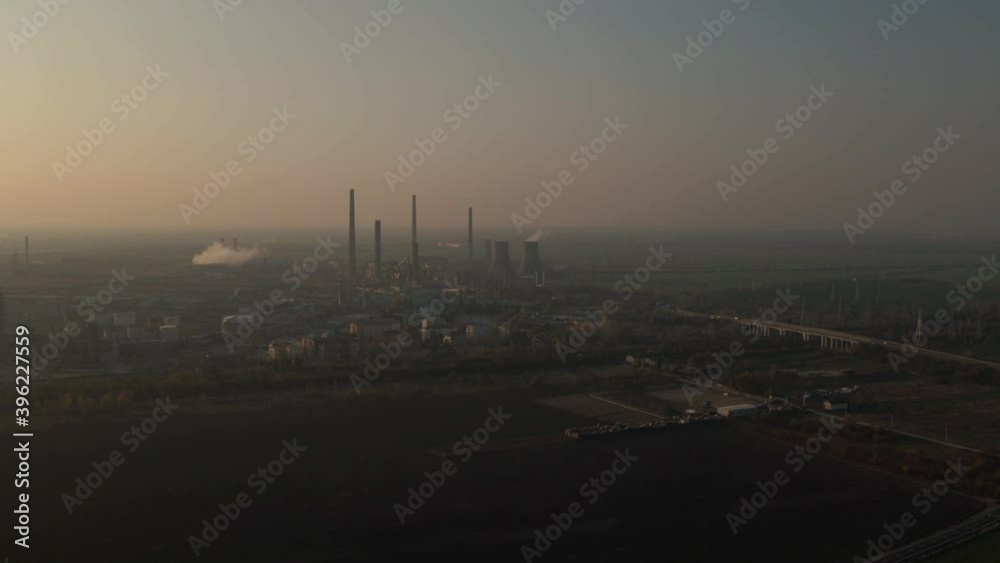 Aerial View of Oil Refinery, Chemical Factory And Power Plant With Many Storage in during foggy day.Ploiesti ,Romania.
Aerial View of Oil Refinery, Chemical Factory And Power Plant With Many Storage in during foggy day.Ploiesti ,Romania.