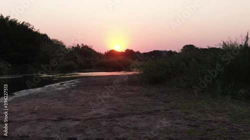 Aerial View of Sunset Above Olifants River and Scenic Landscape of South Africa. Pull Up Drone Shot photo