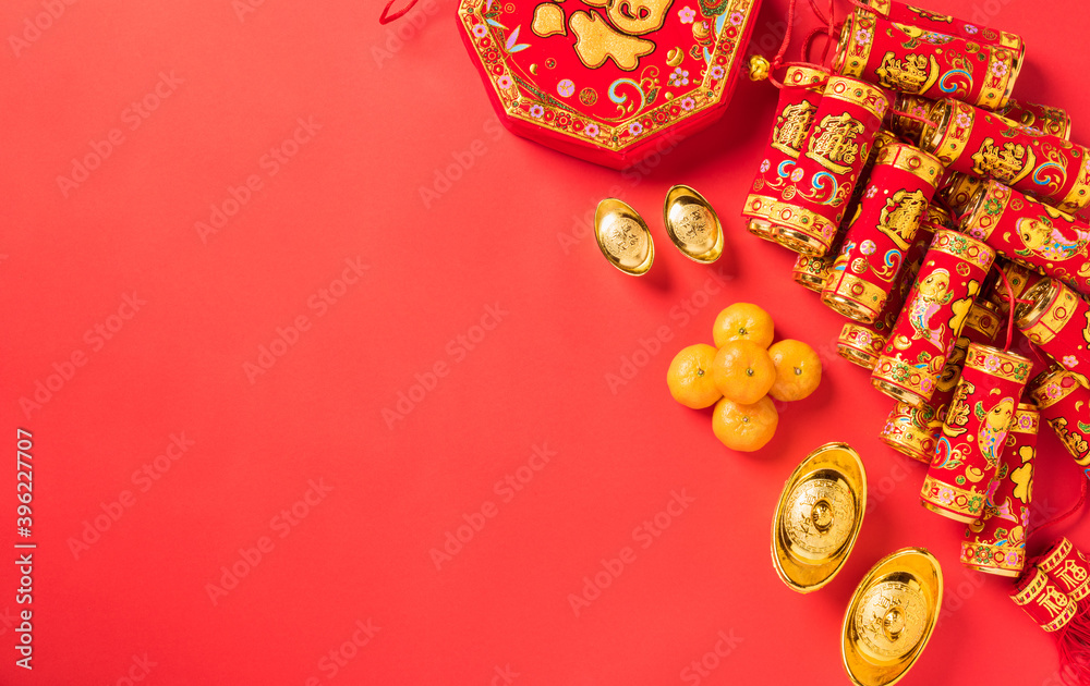 Chinese new year festival, Top view flat lay happy chinese new year or lunar new year decorations celebration with copy space on red background (Chinese character 