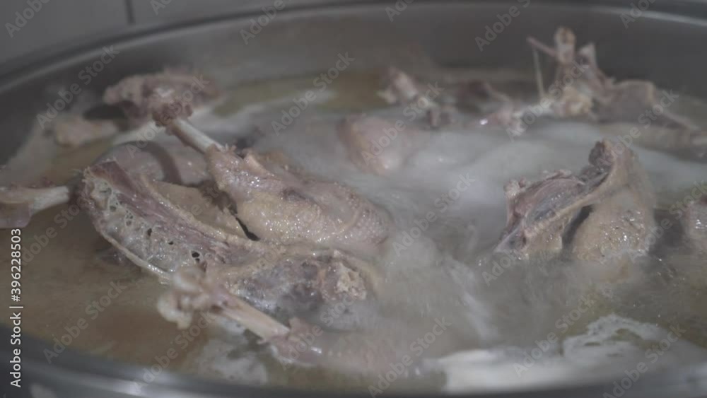 Boiled Chicken In A Pot Broth. Close-up shot Boiled Chicken In A Pot Broth. Close-up shot