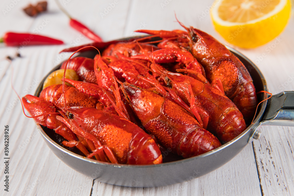 closeup gourmet  lobster on white wooden table