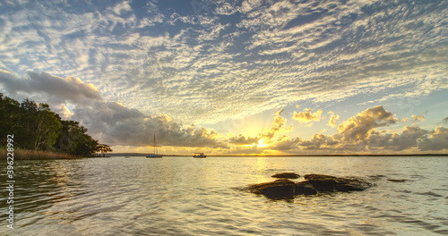 Summer sunrise over the Lake Cootharaba near Boreen Point, on the Sunshine Coast of Australia photo