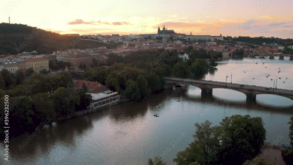 Prague sensational aerial drone view above river Vltava bridges at sunset, tilt up Prague sensational aerial drone view above river Vltava bridges at sunset, tilt up