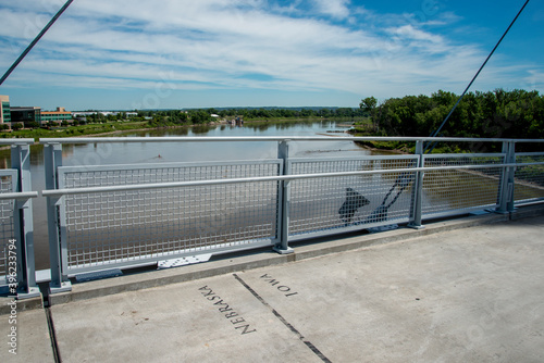  Border seperation marker between Iowa and Nebraska on the Bob Kerrey pedestrian bridge photo