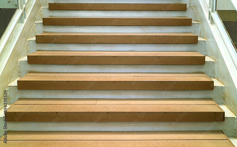 Empty modern style staircase leading to the upper floor Empty modern style staircase leading to the upper floor