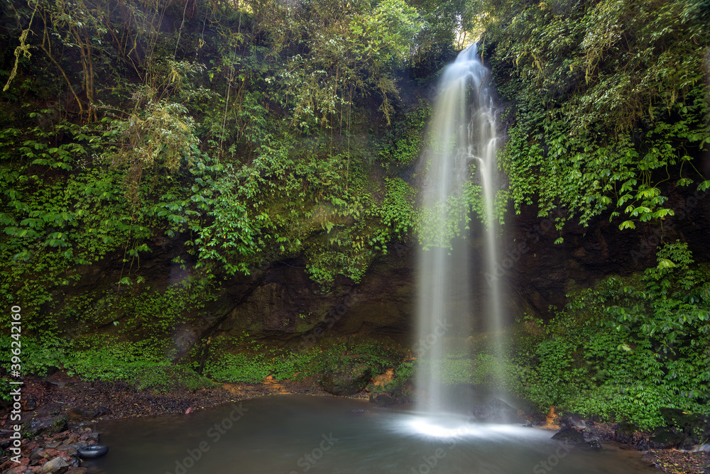 Beautiful waterfall in rural area at bali island, indonesia