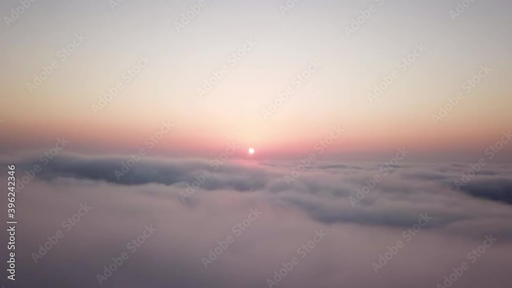 Time lapse of clouds going by during sunrise Time lapse of clouds going by during sunrise
