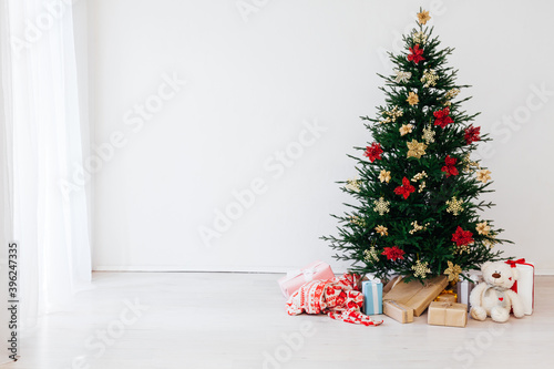 Winter Christmas tree pine with gifts decor interior new year