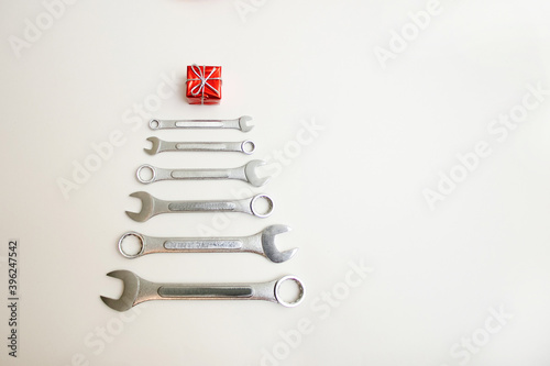 Fotografie Wrenches stacked in a christmas tree shape on white background