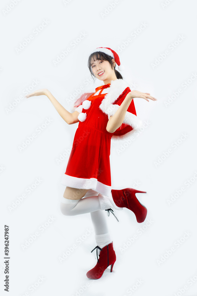 Asian christmas girl showing. Isolate. Full body. Asian christmas girl showing. Isolate. Full body.