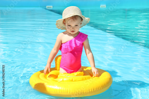 Cute baby girl with inflata...