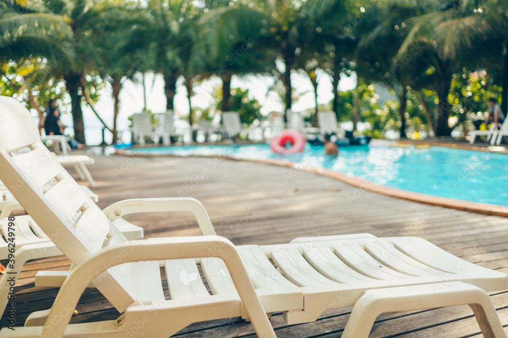 Lounge chairs near the pool at the hotel. Lounge chairs near the pool at the hotel.