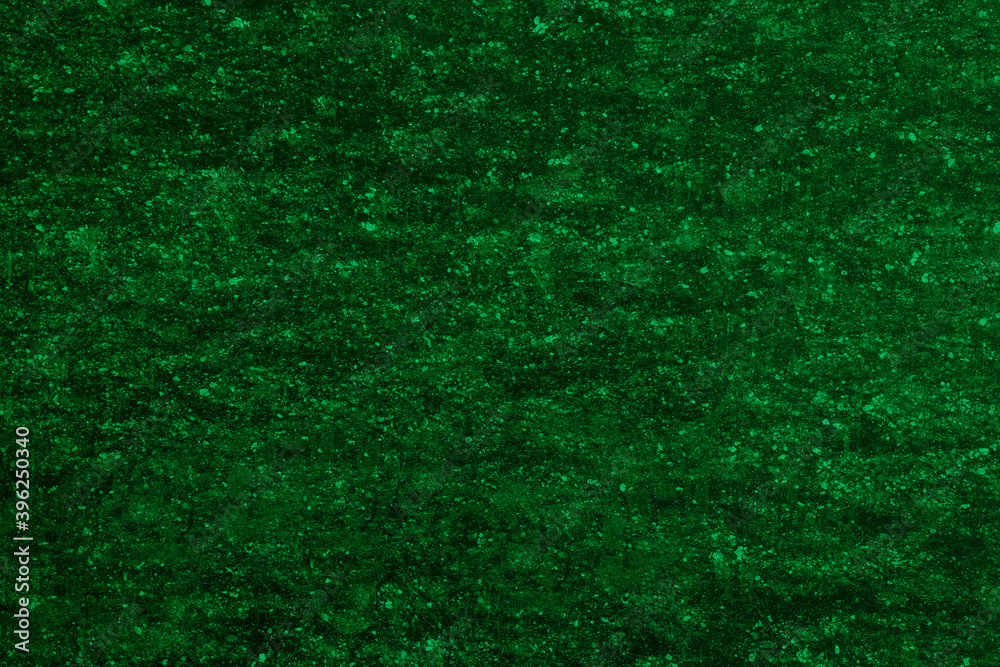 Dark abstract background for the design. Empty green uniform surface. Dark abstract background for the design. Empty green uniform surface.