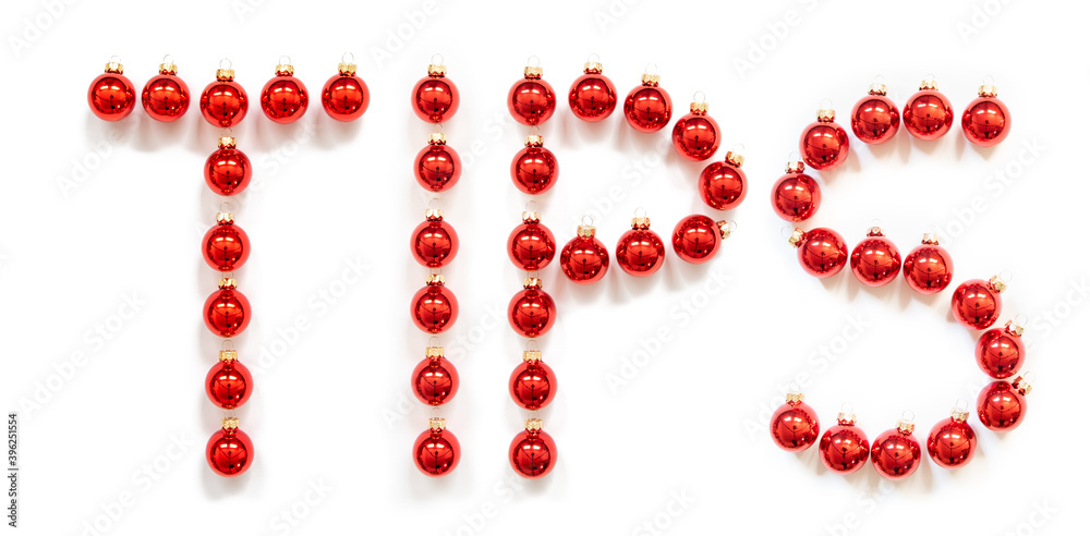Red Christmas Ball Ornament Building English Word Tips. Festive Christmas Decoration. White Isolated Background Red Christmas Ball Ornament Building English Word Tips. Festive Christmas Decoration. White Isolated Background