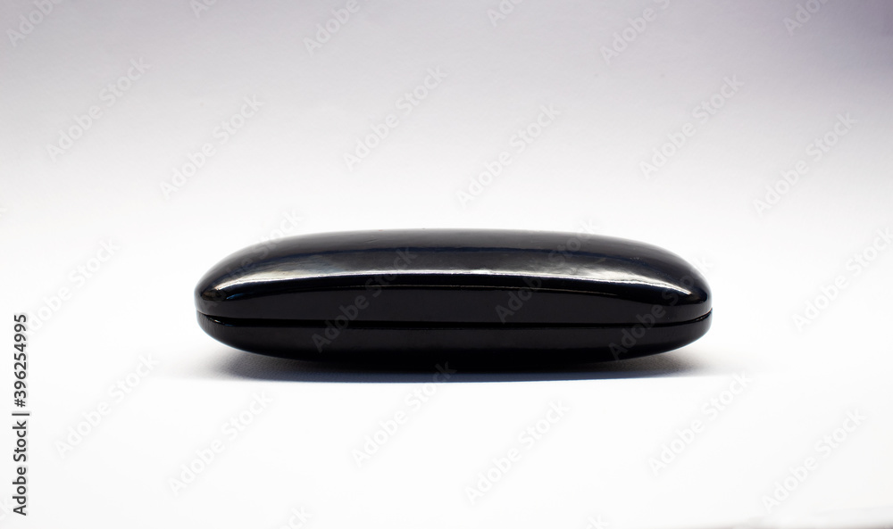 Isolated glasses case on a white background with shadows Isolated glasses case on a white background with shadows