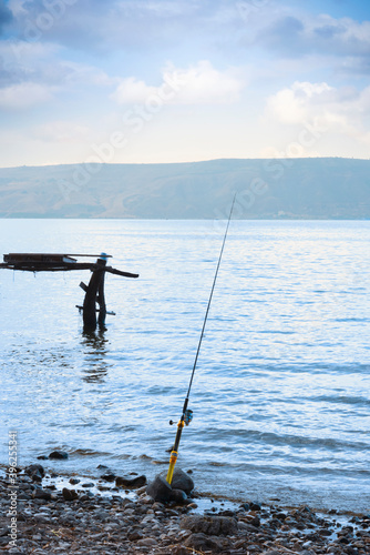 Fishing rod over the Sea of Galilee and Golan Heights. High quality photo.