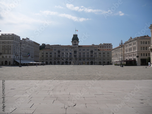 Piazza Unità d'Italia in Trieste, surrounded by numerous buildings like Palace of Lloyd, Palace of the Austrian Lieutenancy and with the Town Hall in the background