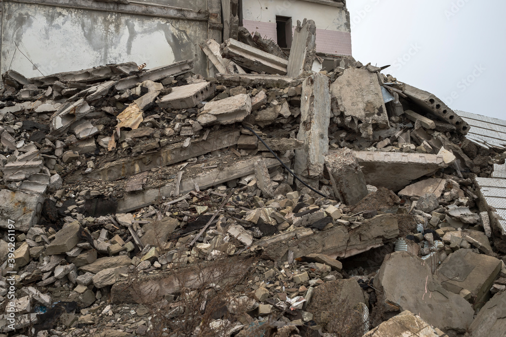 Blockage of bricks, pieces of concrete and other construction debris of the destroyed building. Blockage of bricks, pieces of concrete and other construction debris of the destroyed building.