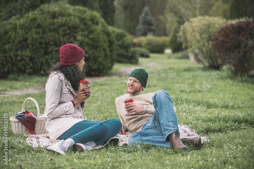 Happy couple having a picnic during the date