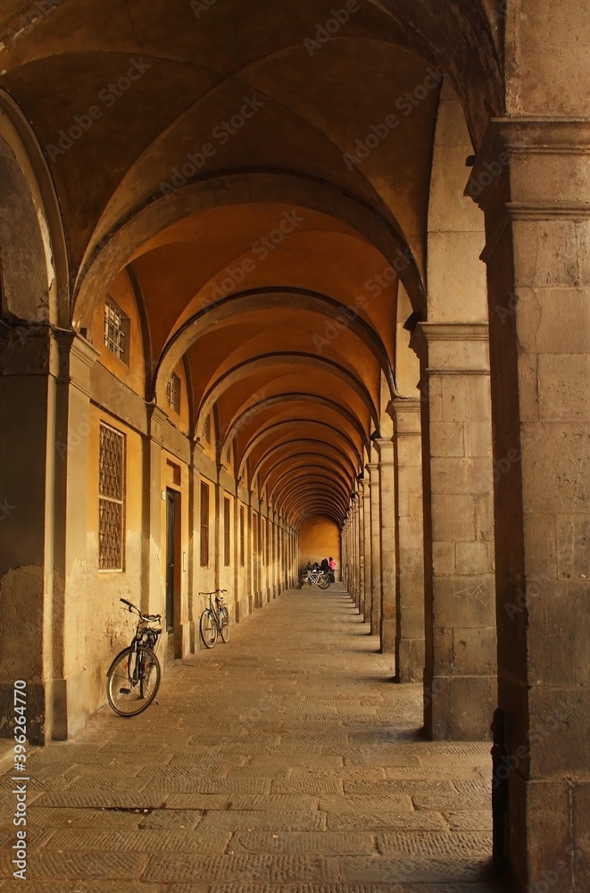 Fototapeta premium Medieval architecture, arched corridor in Siena, Tuscany, Italy