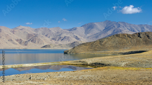 Scenic mountain landscape view of high-altitude Yashilkul lake in the Pamir mountains of Gorno-Badakshan, Tajikistan