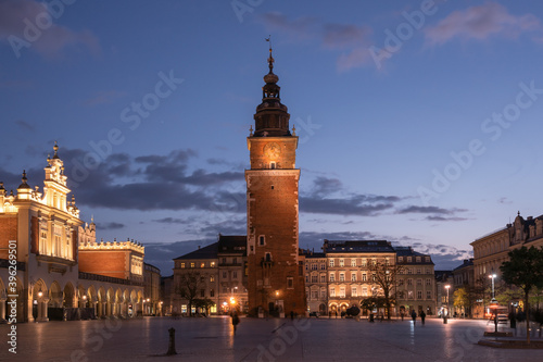 Krakow attractions in market square in the evening. Symbol of Krakow, Poland Europe.