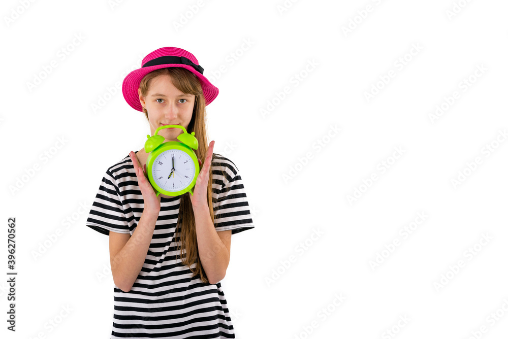 Teen Girl holding alarm Clock, isolated on white background. Portrait of caucasian teenager showing alarm clock. Teen Girl holding alarm Clock, isolated on white background. Portrait of caucasian teenager showing alarm clock.