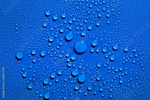 Droplets on blue background