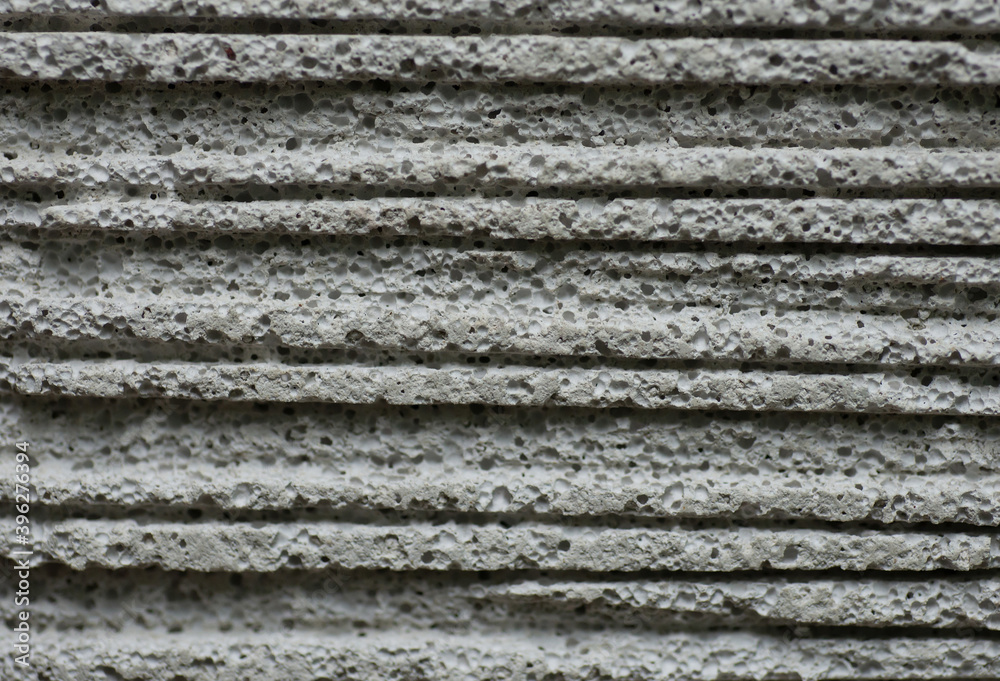 Textures and porosity photos of white concrete surfaces.