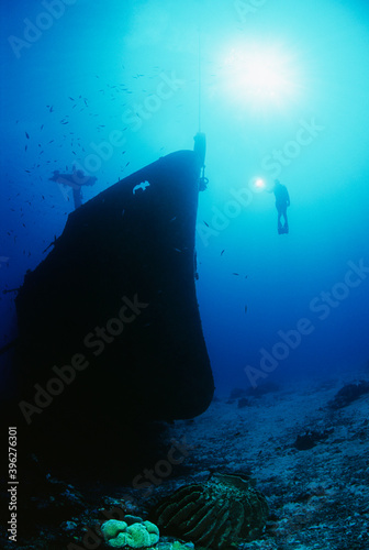 Scuba Diver Exploring Sunken Ship